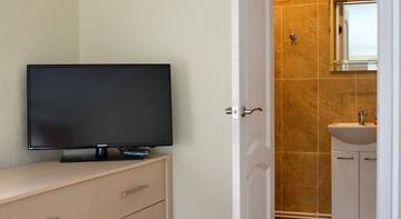 Фото номера Улучшенный двухместный номер с 1 кроватью Гостиница Guest House Na Radonezhskoy г. Сергиев Посад 6
